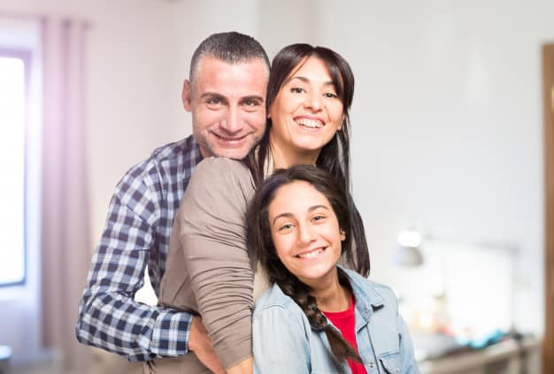 parents with daughter happy