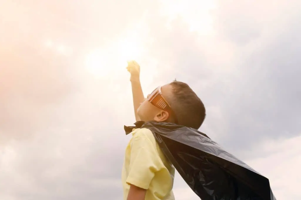 boy looking up the sky