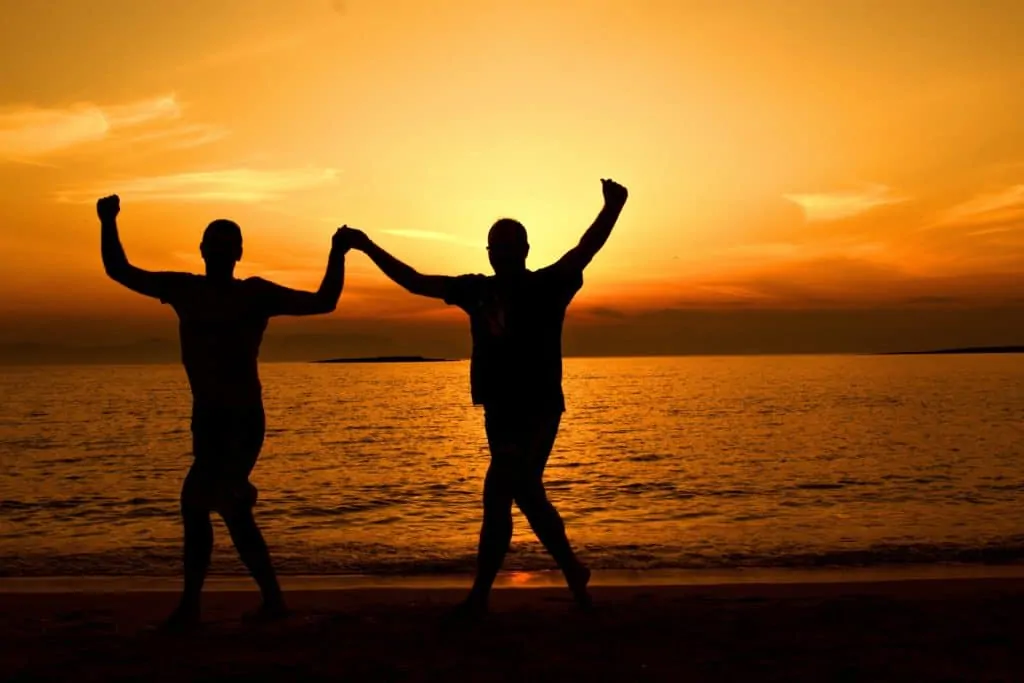 silhouette of people on beach